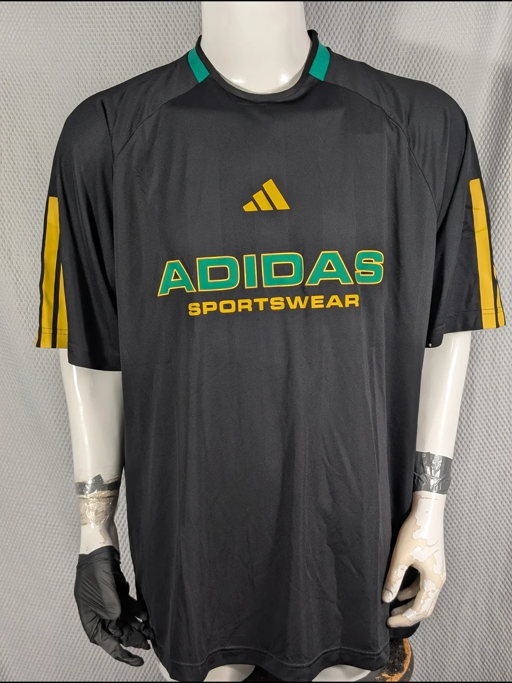 adidas Black Jersey Tee with Yellow & Green Logo - Picture 1 of 12